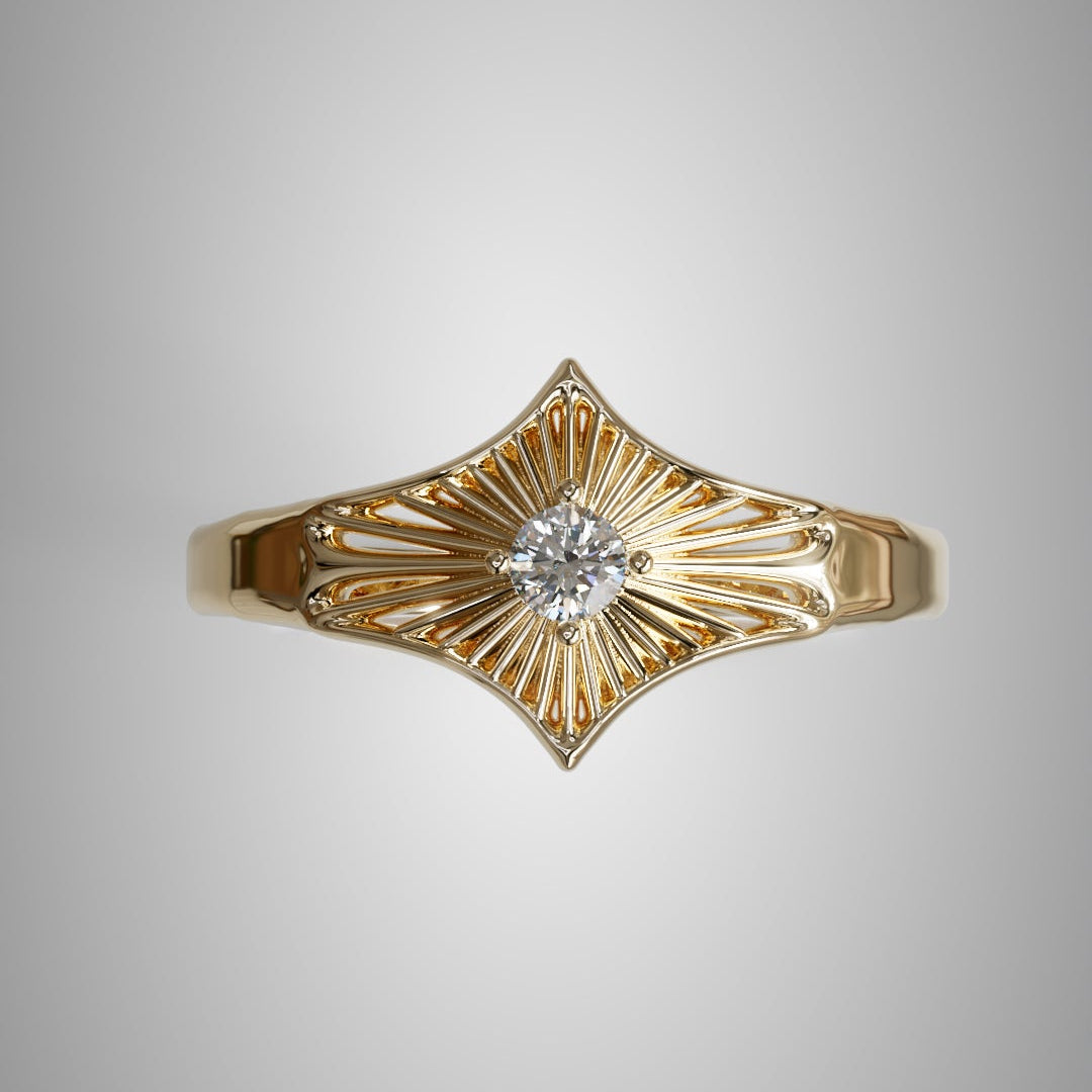 Gold ring with diamond on a gray background