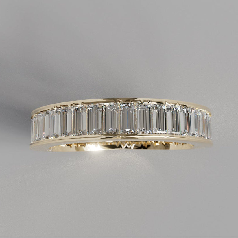 Aurel gold wedding band with rectangular baguette diamonds, top view