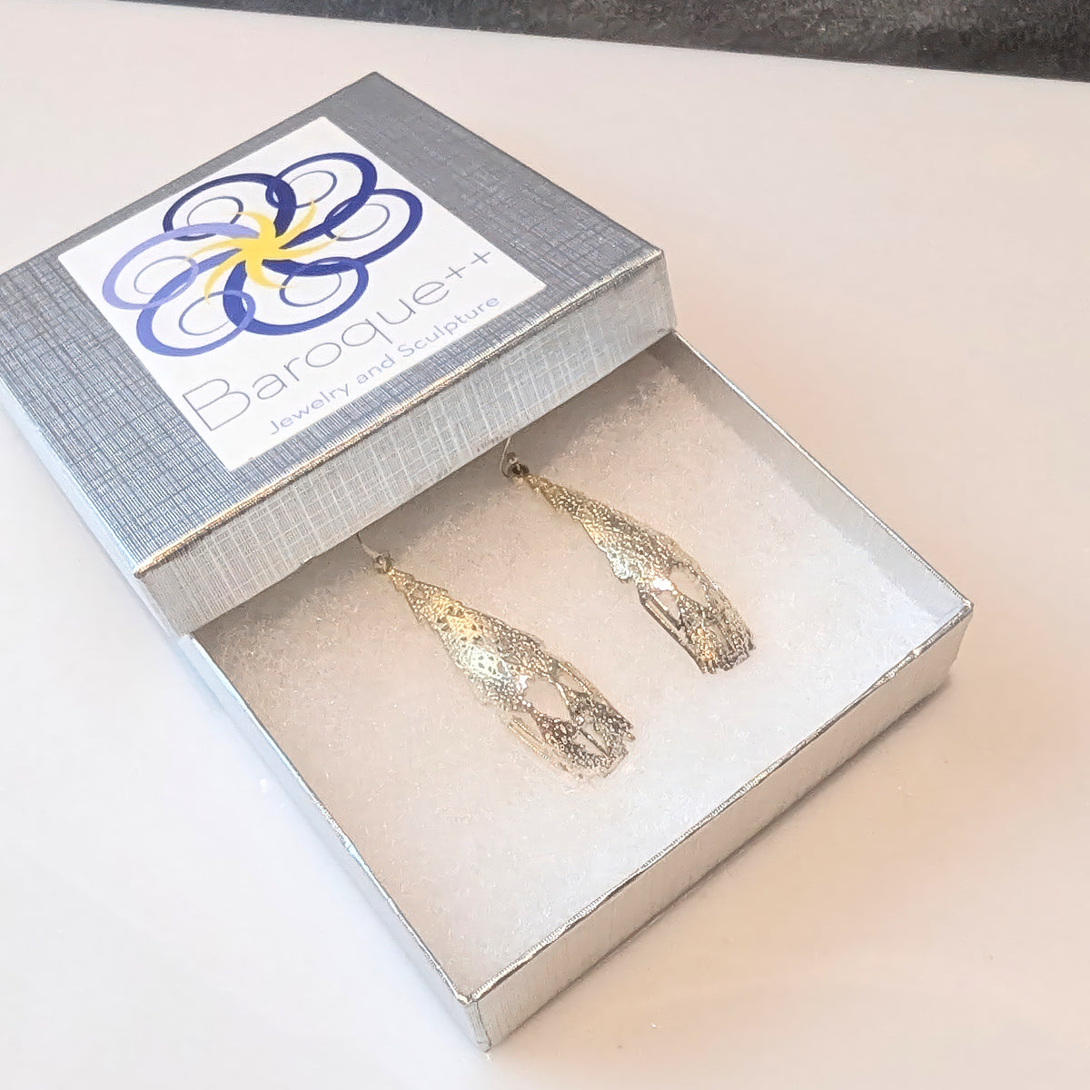 Silver Cellular Automata earrings in a Baroque++ gift box