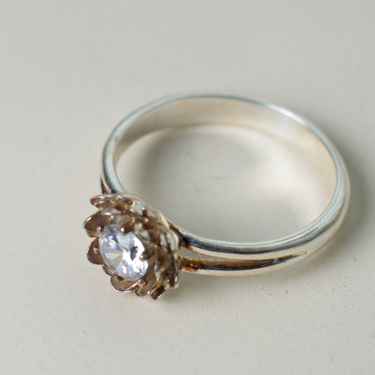 Lotus solitaire ring in platinum, a spiritual engagement ring