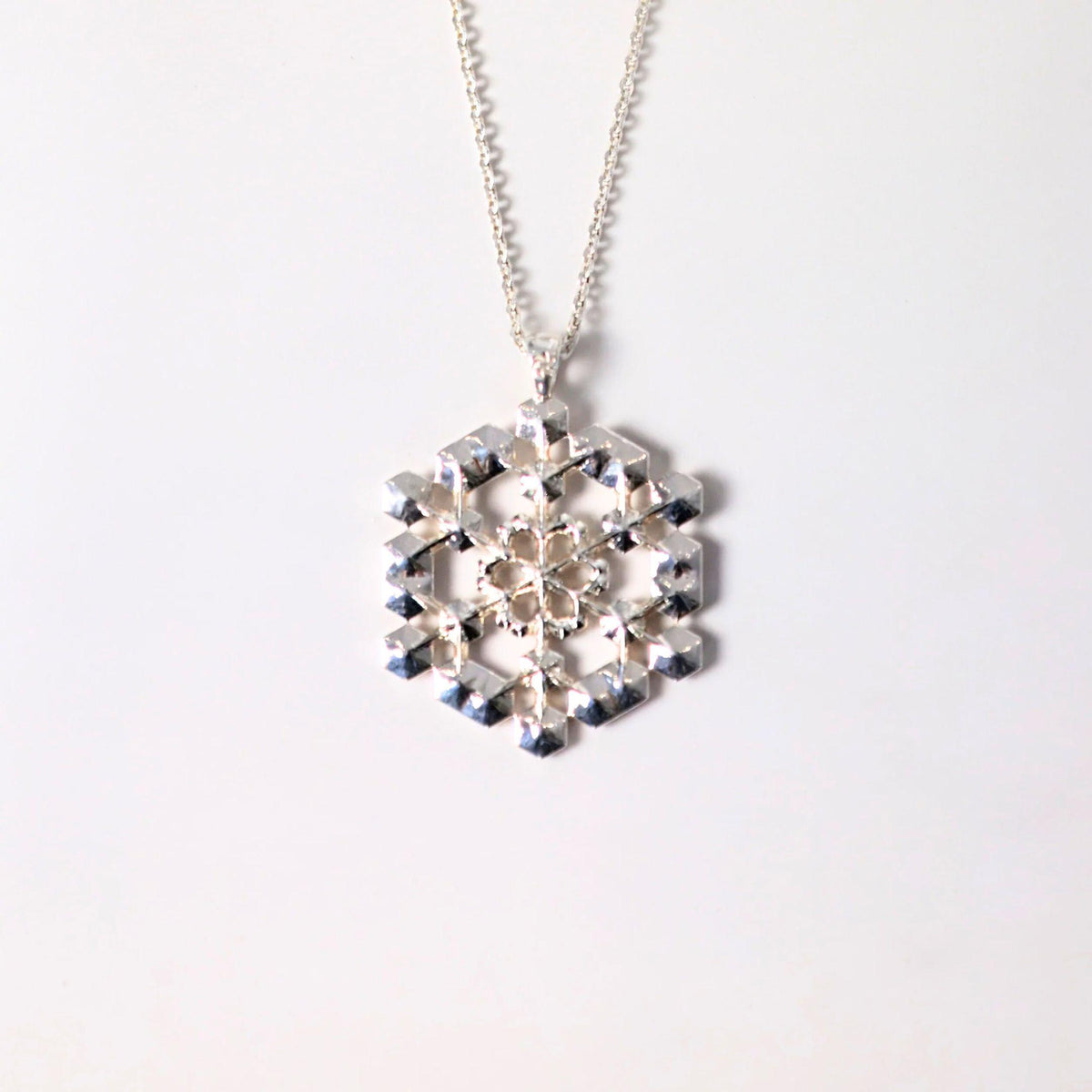 Snowflake Pendant No. 1 in sterling silver, a one-of-a-kind snowflake necklace, by Baroque++
