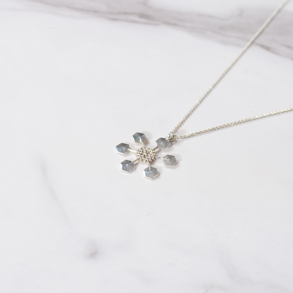 Silver snowflake pendant No. 4, a secular holiday gift