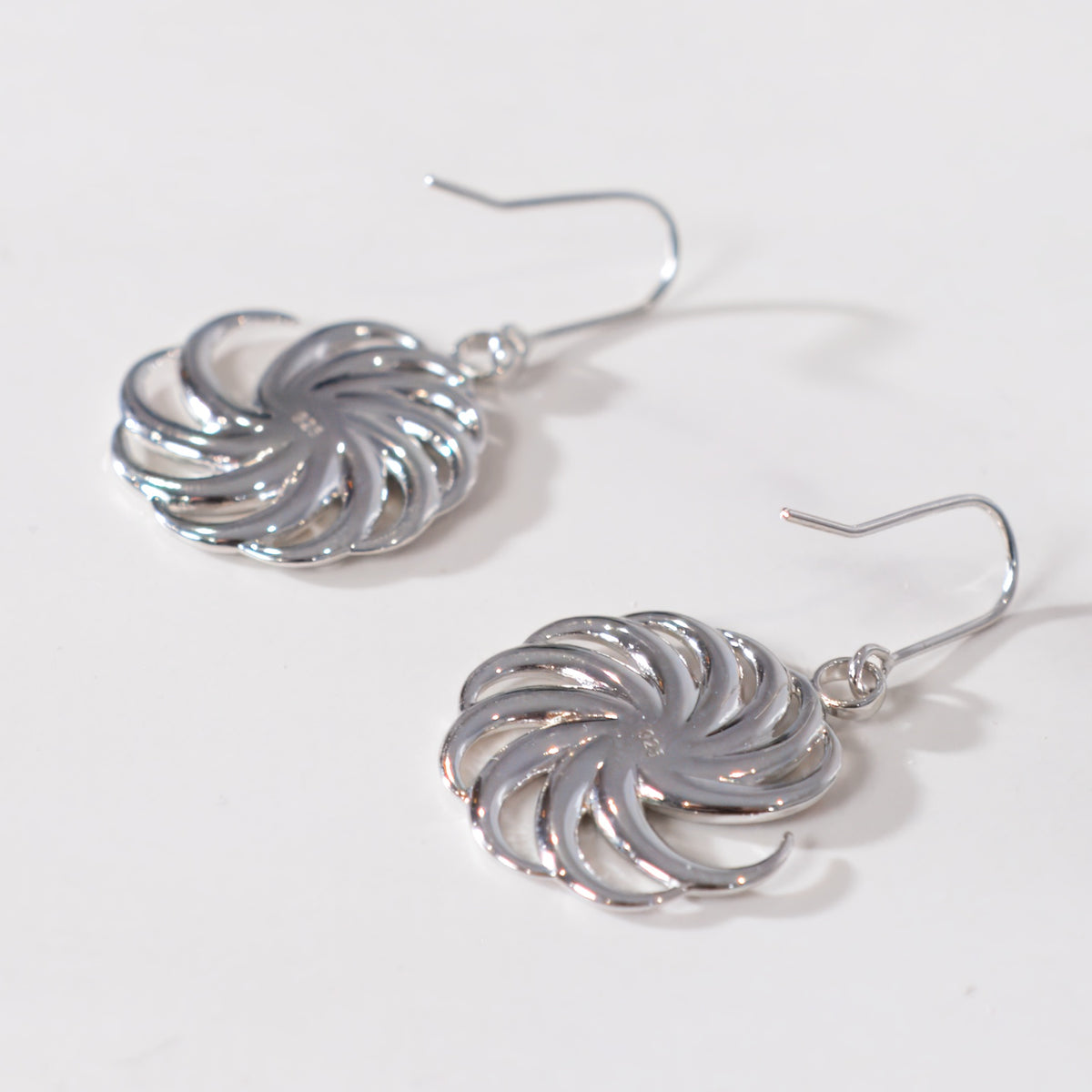 Silver Spiral Earrings on a white background