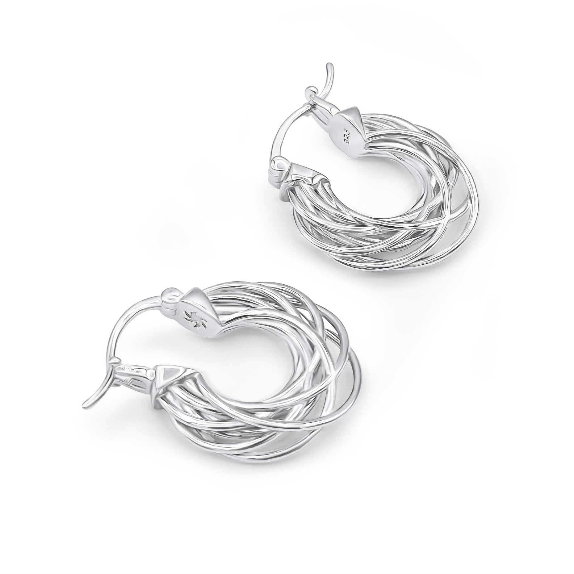 A pair of silver hoop earrings with intricate details, inspired by the movement of satellites in space.