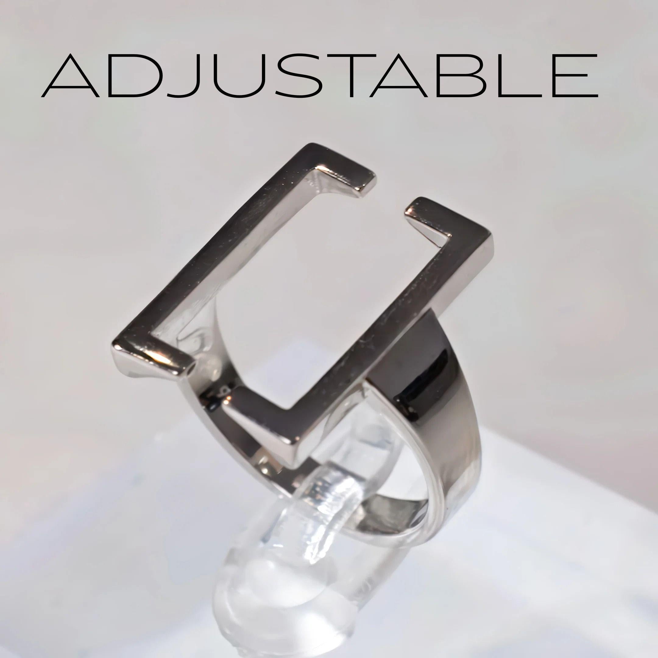 A picture of an open ring with the words "Adjustable"