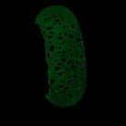Glowing green bracelet on a black background