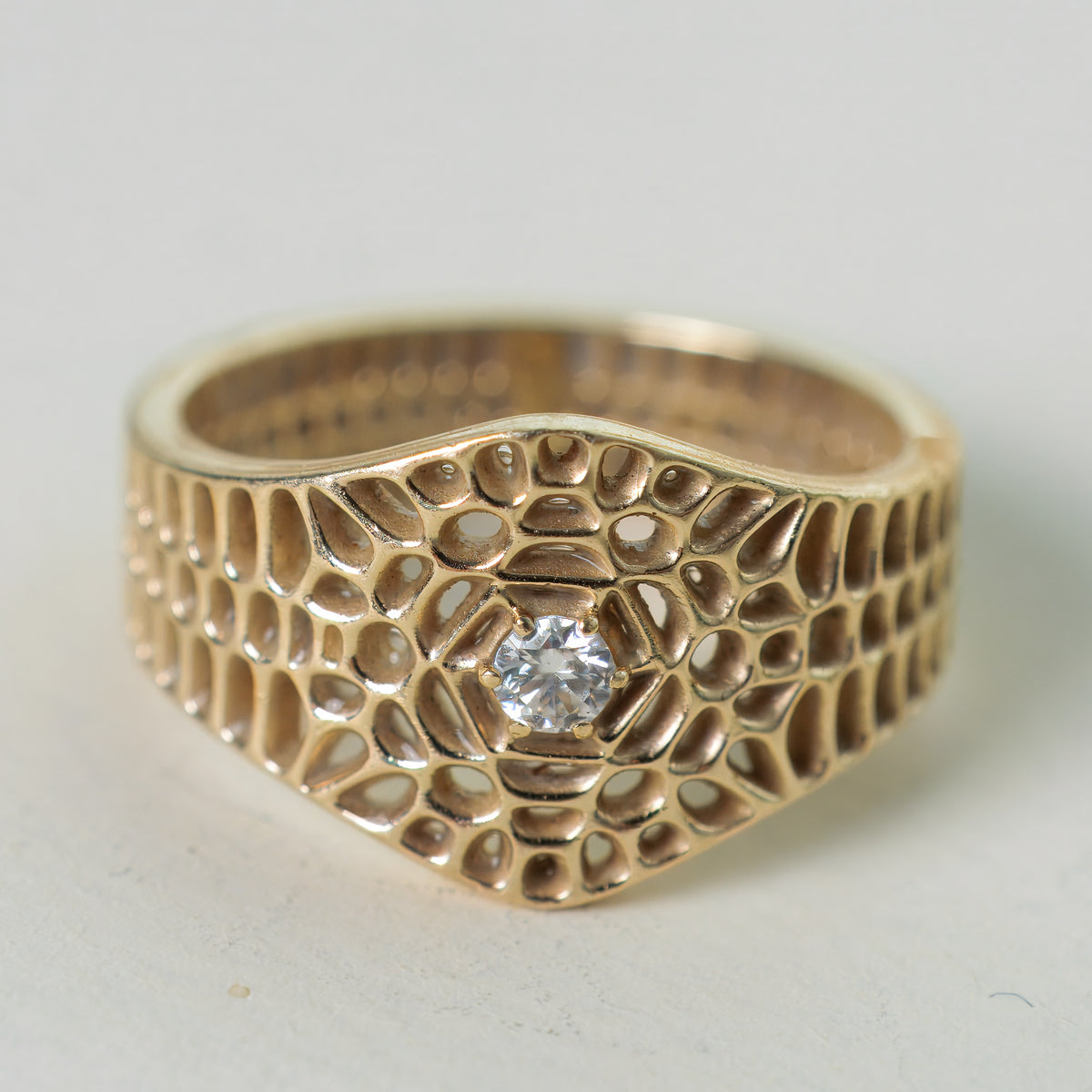 Hive Honeycomb Ring in gold, a geometric Voronoi statement ring, by Baroque++