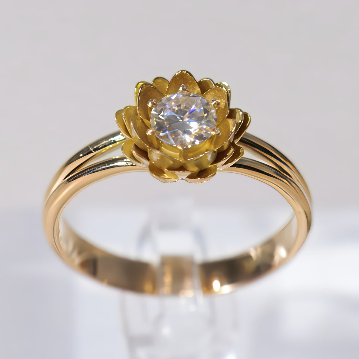 Buddhist lotus engagement ring in gold on a light gray background