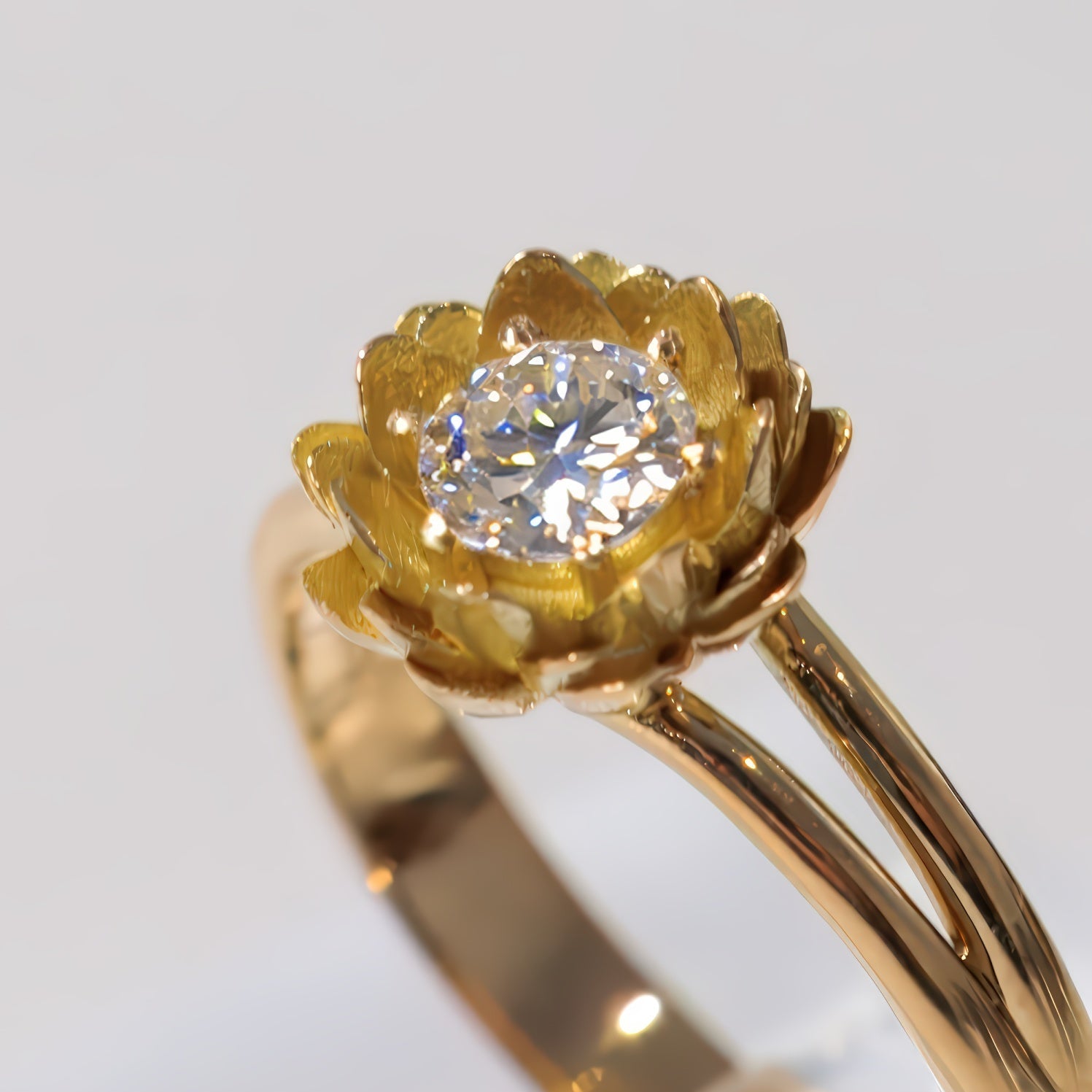 Gold ring with a diamond in the center on a white background