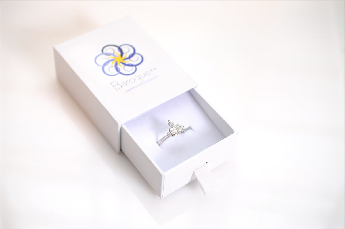 Mandelbrot diamond engagement ring in a Baroque++ jewelry box
