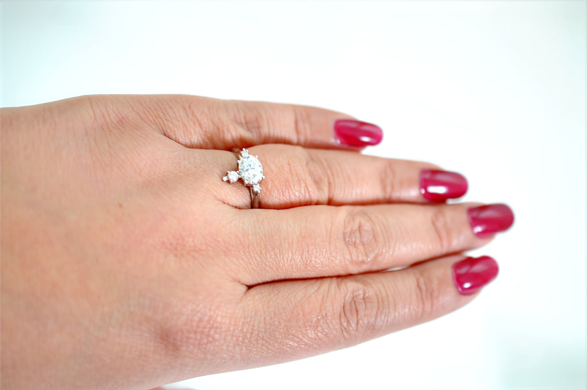 Hand wearing the Mandelbrot fractal diamond engagement ring