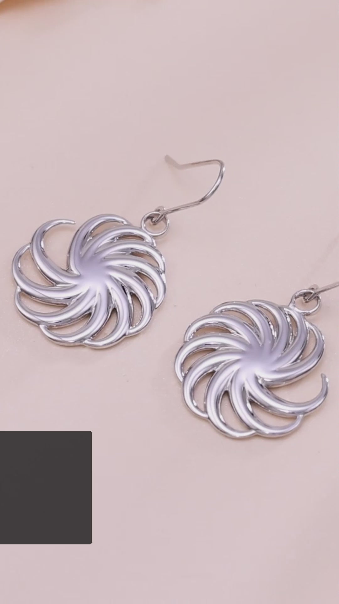 video of sterling silver spiral earrings