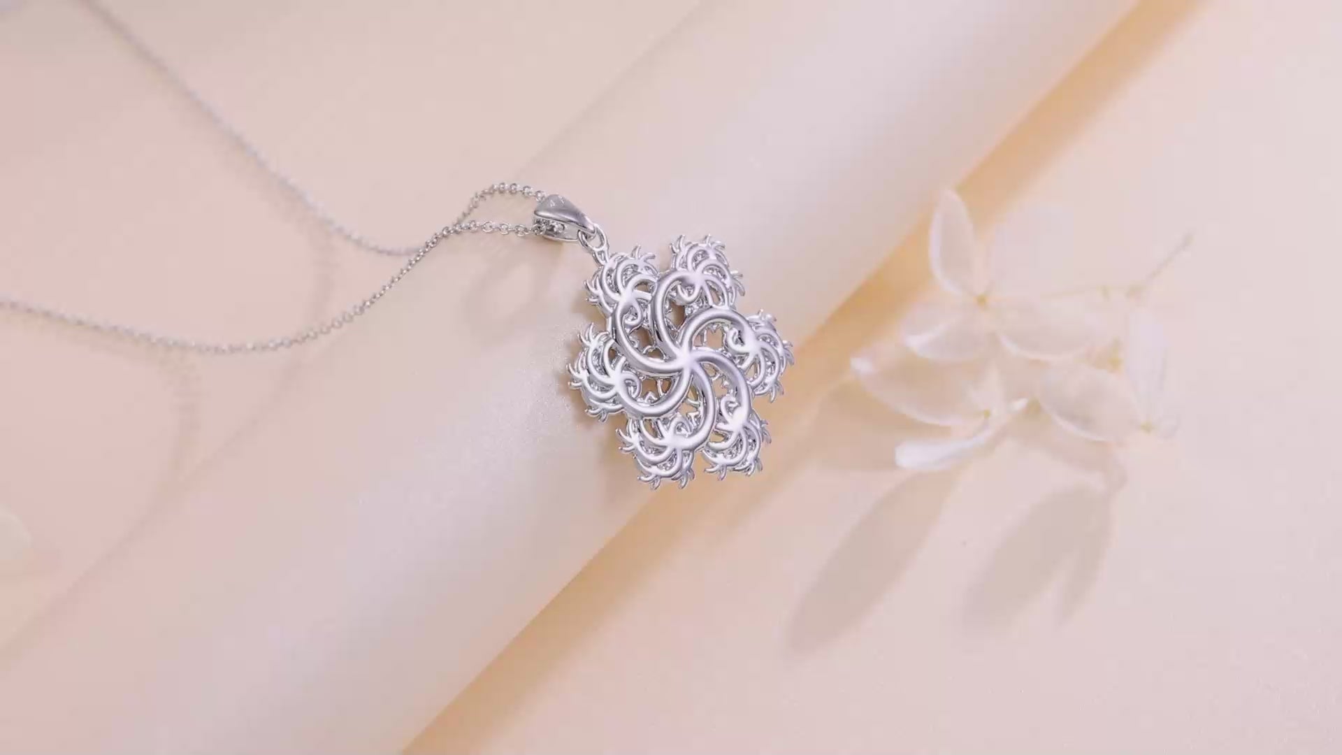 a video of the six-pointed pendant up close and on a model.