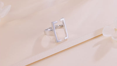 video of a square ring rotating and on a model