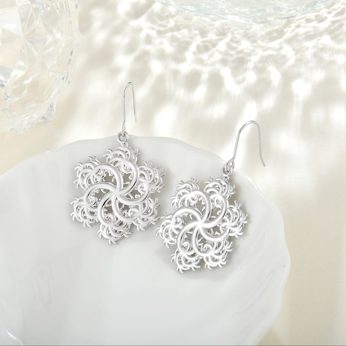 Six-Pointed vortex earrings, alternate view