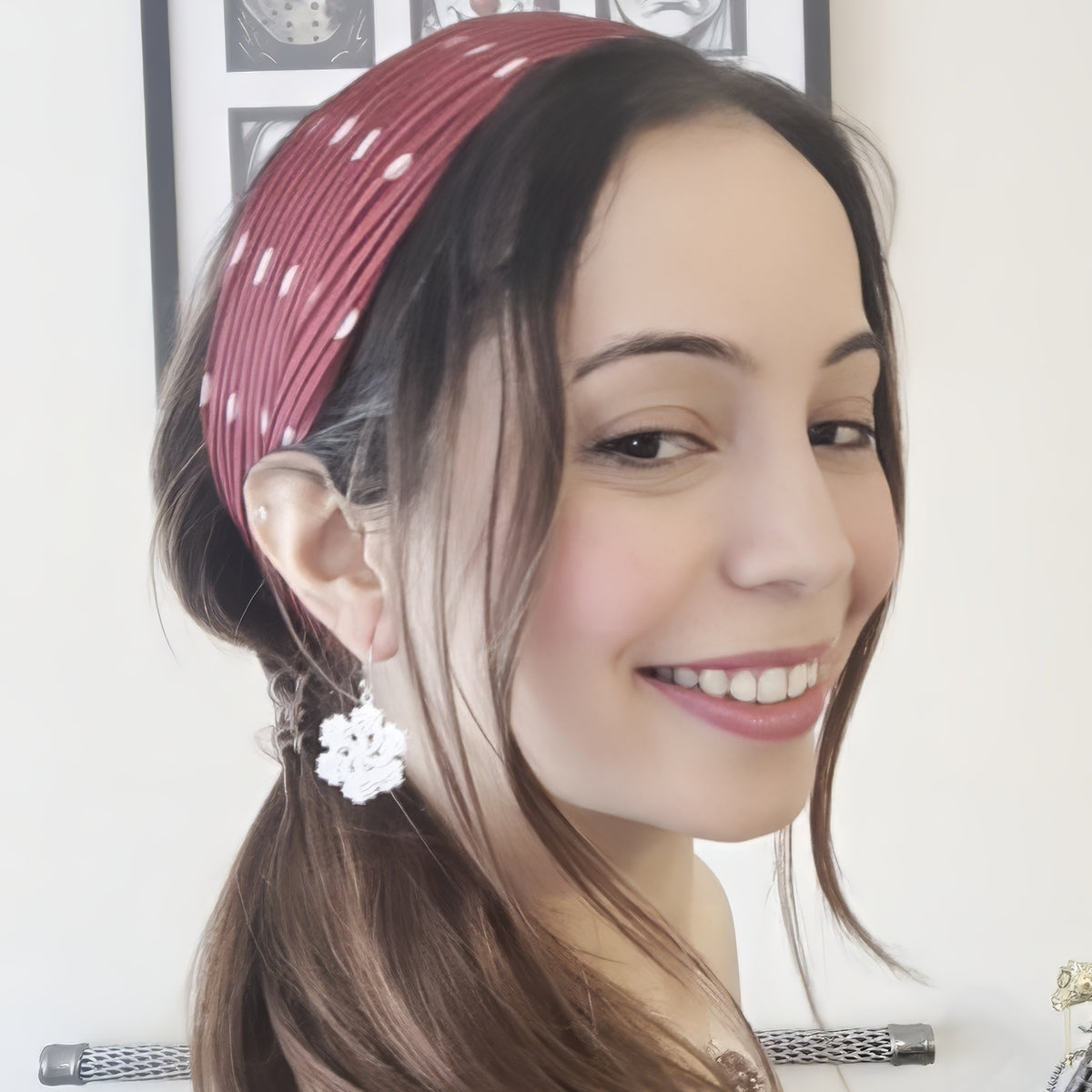 Six-Pointed snowflake earrings worn by a model