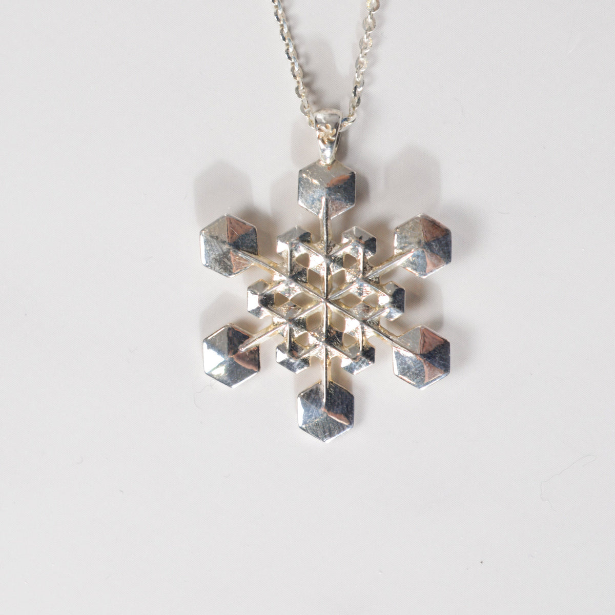 Snowflake Pendant No. 3 in sterling silver on a chain, a one-of-a-kind snowflake necklace, by Baroque++