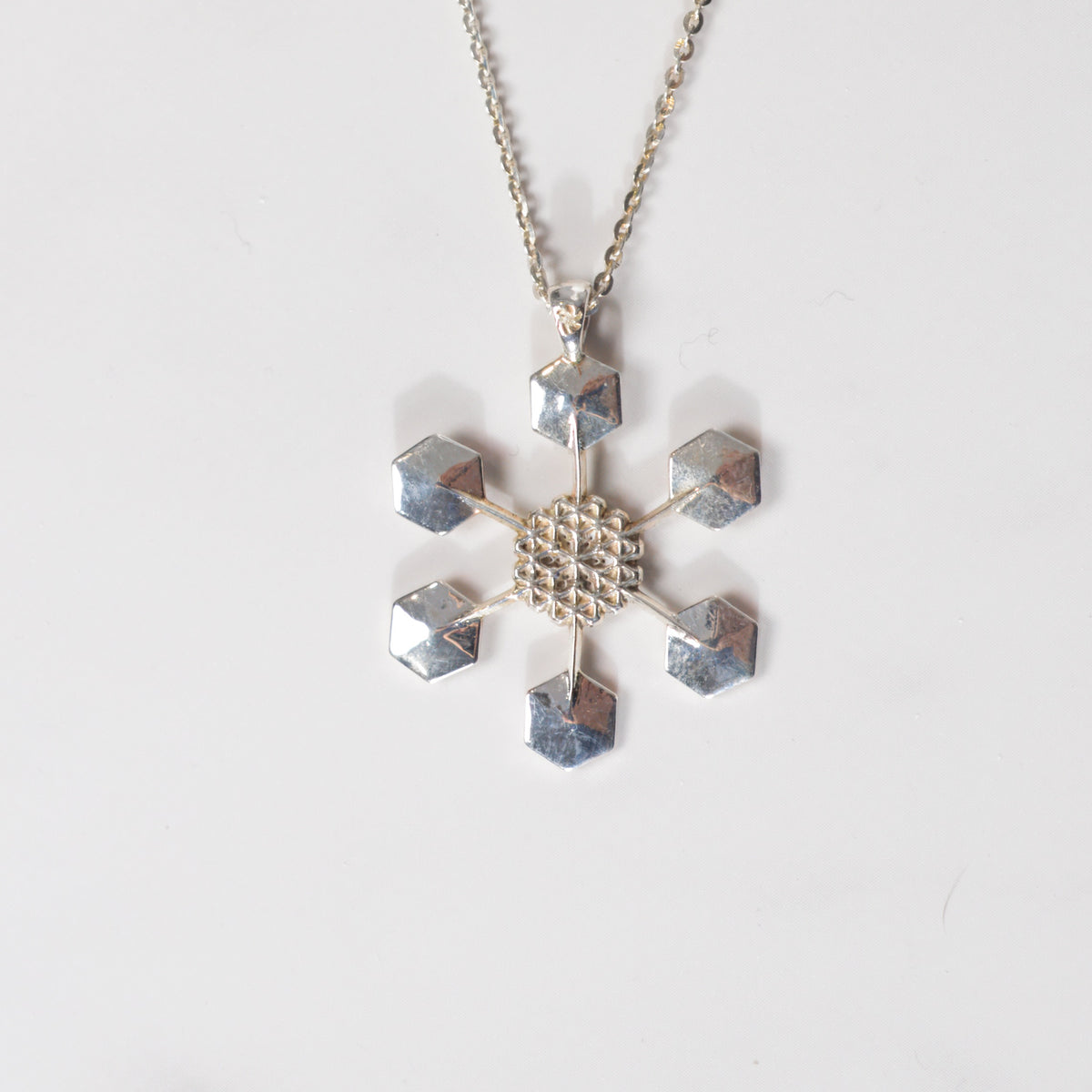 Snowflake Pendant No. 4 in sterling silver, a one-of-a-kind snowflake necklace, by Baroque++