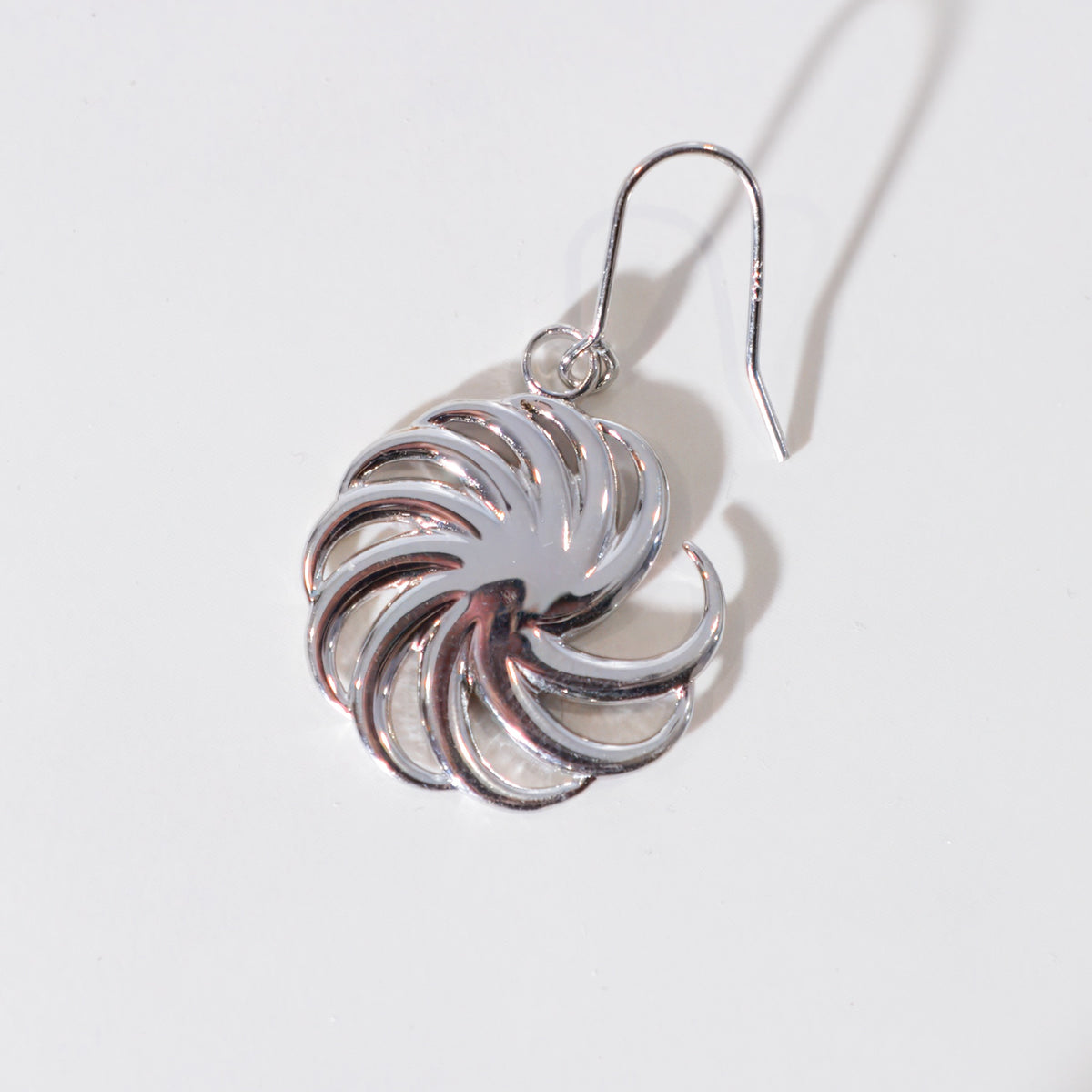 Silver spiral drop earring, alternate view