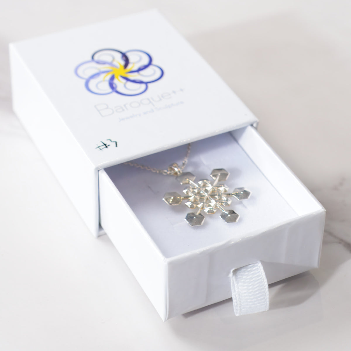 One-of-a-kind sterling silver snowflake pendant