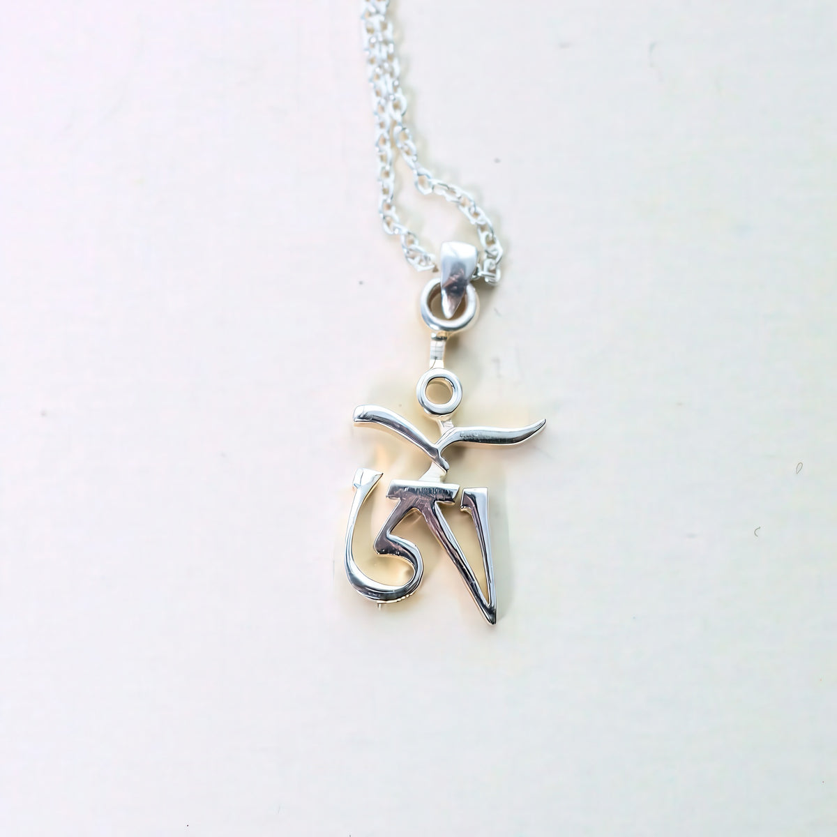 Tibetan Om Pendant, a Buddhist meditation necklace
