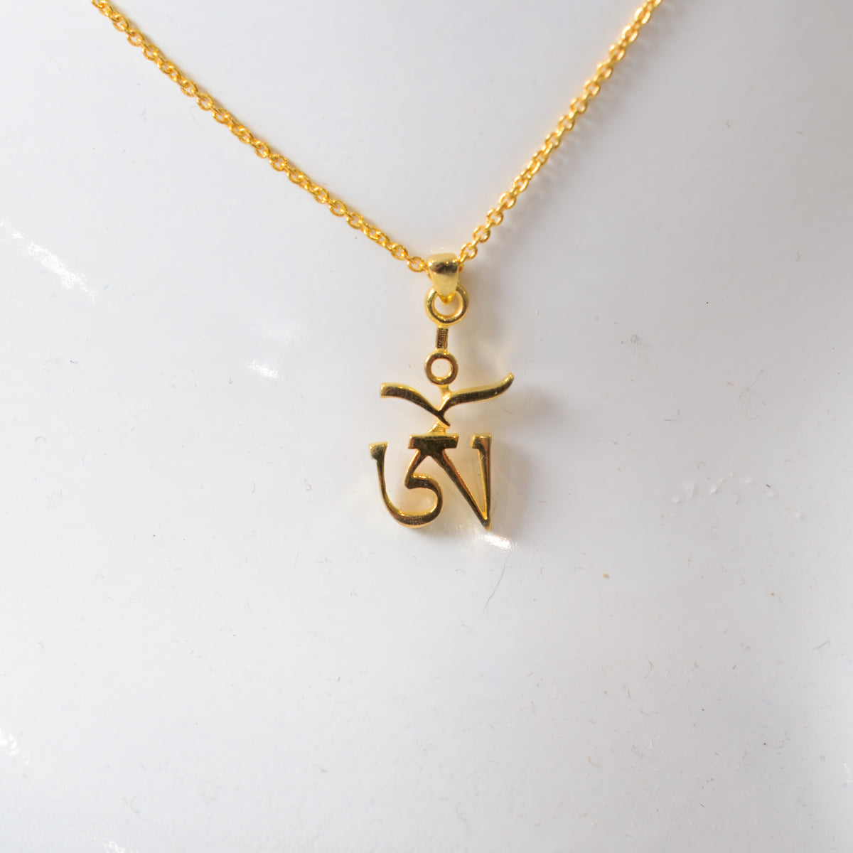 Tibetan Om Pendant in sterling silver, a Tibetan Buddhist om necklace, by Baroque++